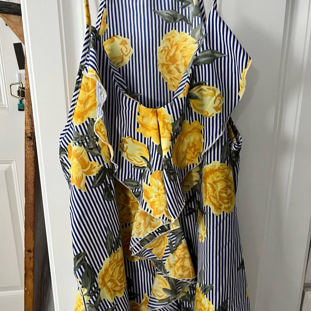 Beautiful pin stripe blouse with yellow bloom detail. Size medium